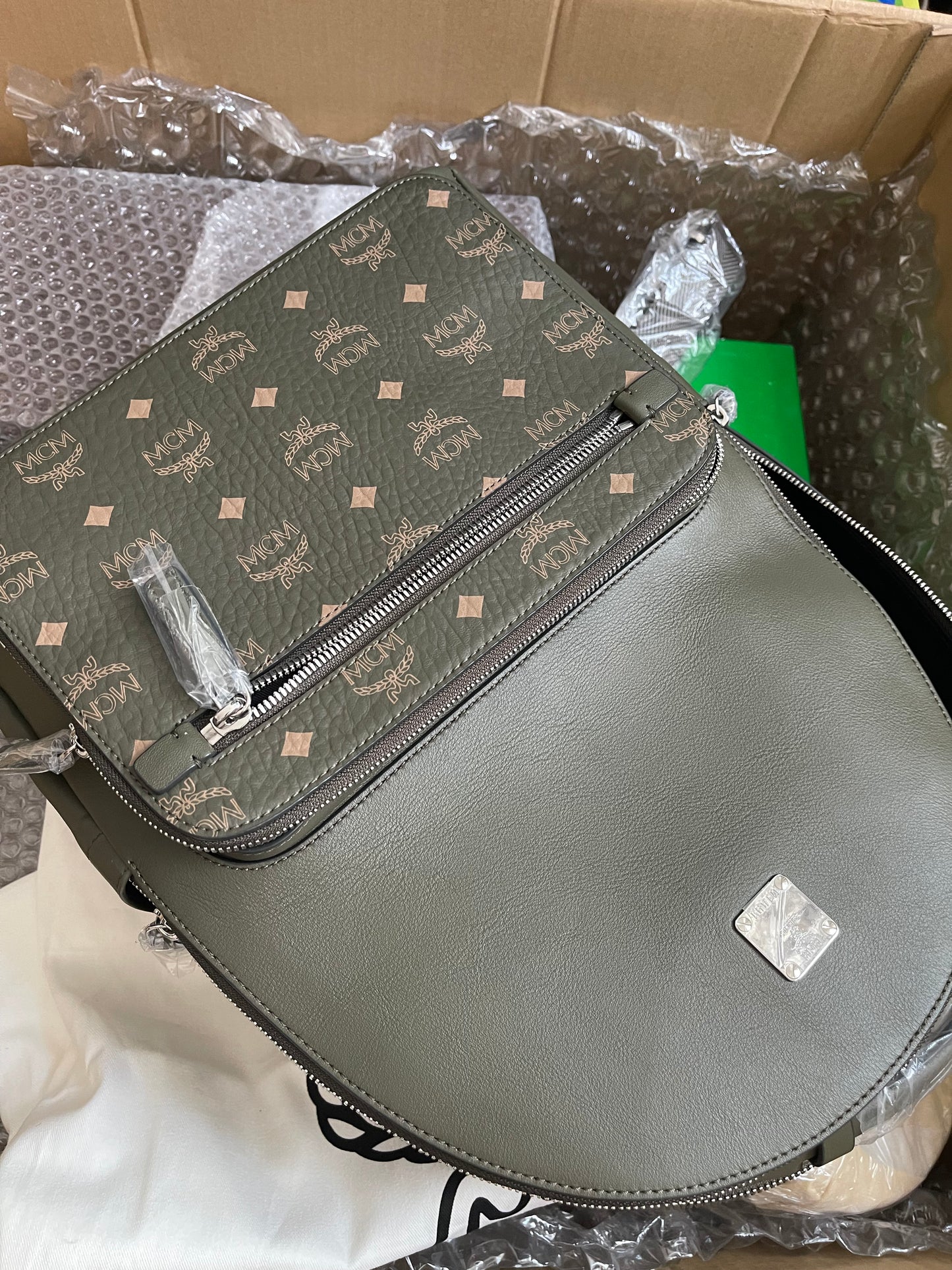 Preloved MCM Stark Leather Backpack in SEA TURTLE
