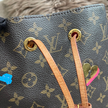 Preloved Authentic Louis Vuitton NéoNoé BB — Monogram Love Lock (Limited Edition)
