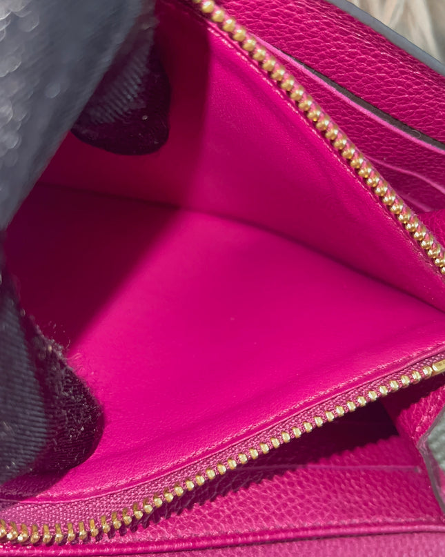 Preloved Authentic Louis Vuitton Monogram Empreinte Sarah Wallet – Fuchsia