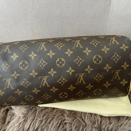 Preloved Authentic Louis Vuitton Montorgueil PM bag in monogram canvas