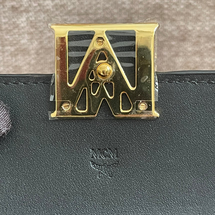 Preloved Authentic MCM Mena Trifold Wallet – Cognac Visetos