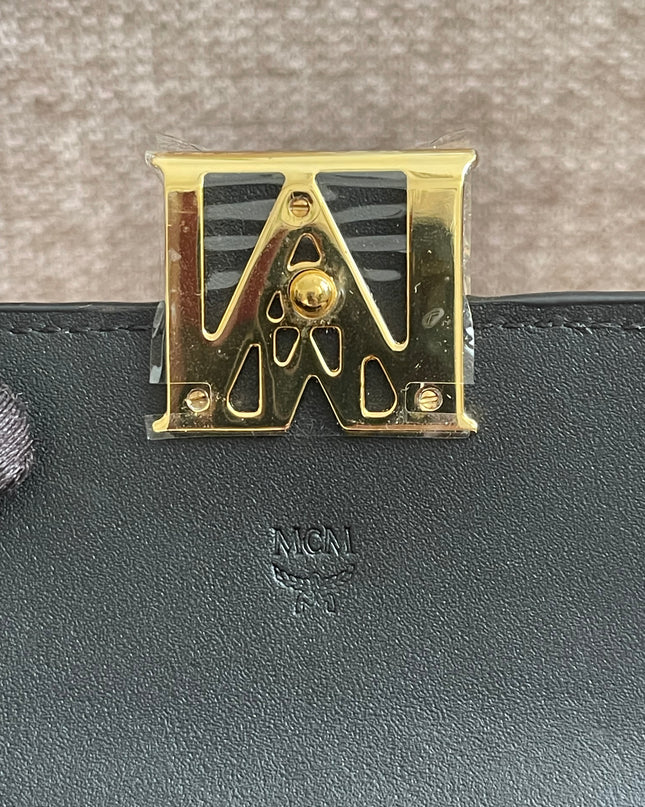 Preloved Authentic MCM Mena Trifold Wallet – Cognac Visetos