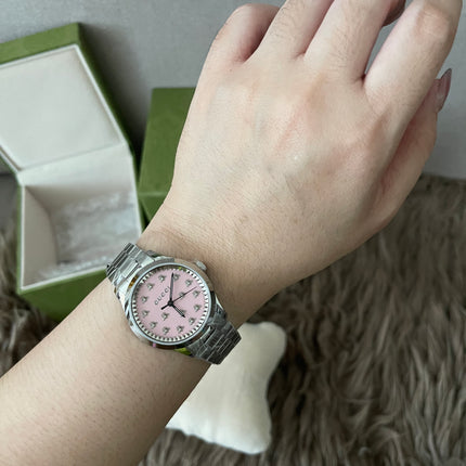 Preloved Authentic Gucci G-Timeless ladies watch pink dial with bee motifs