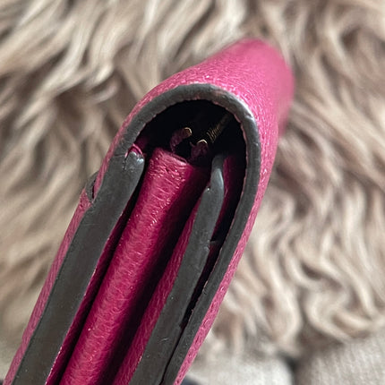 Preloved Authentic Louis Vuitton Monogram Empreinte Sarah Wallet – Fuchsia
