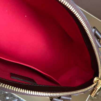 Preloved Louis Vuitton Pre-Owned
2012 Verona PM shoulder bag w/provided strap