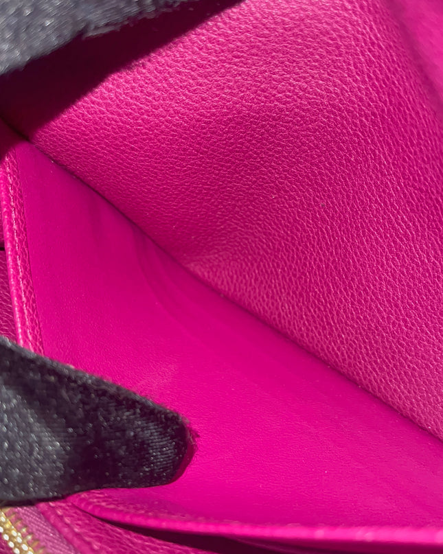 Preloved Authentic Louis Vuitton Monogram Empreinte Sarah Wallet – Fuchsia