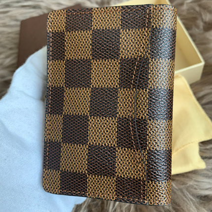 LOUIS VUITTON
Damier Ebene Canvas Pocket Organizer