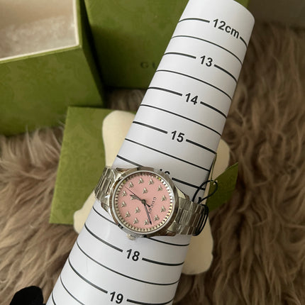 Preloved Authentic Gucci G-Timeless ladies watch pink dial with bee motifs