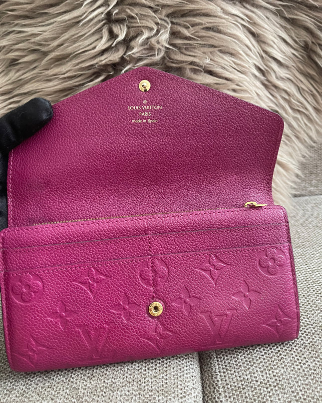 Preloved Authentic Louis Vuitton Monogram Empreinte Sarah Wallet – Fuchsia