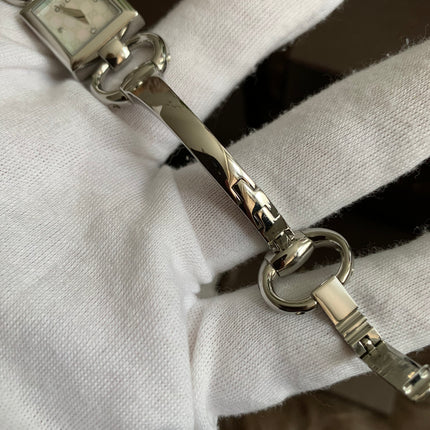 Gucci Tornavoni Women's Watch, 0.7 inch (18 mm), Quartz, White Pearl YA120517