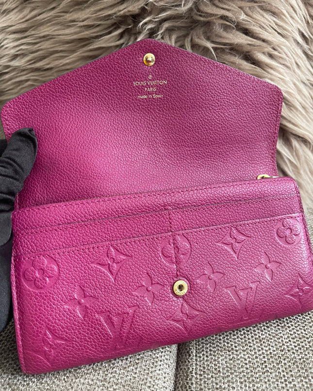Preloved Authentic Louis Vuitton Monogram Empreinte Sarah Wallet – Fuchsia