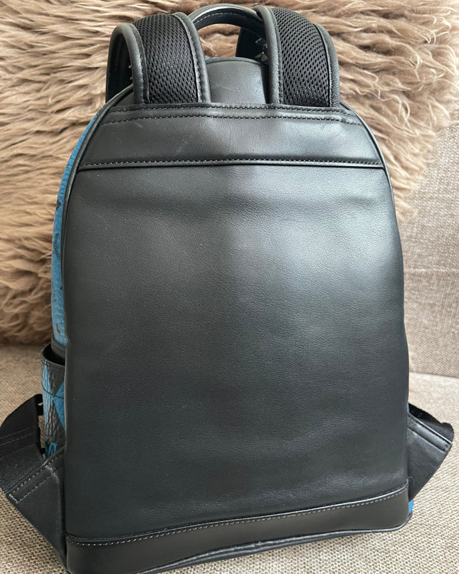 Preloved Authentic MCM Stark Backpack in Blue Black Visetos