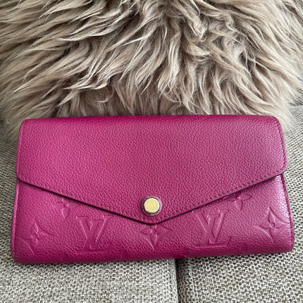 Preloved Authentic Louis Vuitton Monogram Empreinte Sarah Wallet – Fuchsia