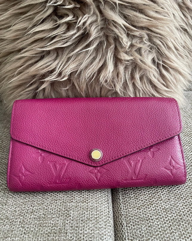 Preloved Authentic Louis Vuitton Monogram Empreinte Sarah Wallet – Fuchsia