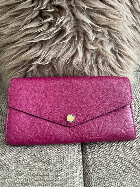 Preloved Authentic Louis Vuitton Monogram Empreinte Sarah Wallet – Fuchsia