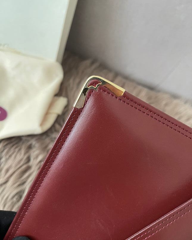 Preloved Authentic Cartier Must de Cartier Burgundy Leather Clutch