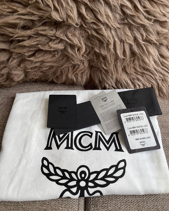 Preloved Authentic MCM Stark Backpack in Blue Black Visetos