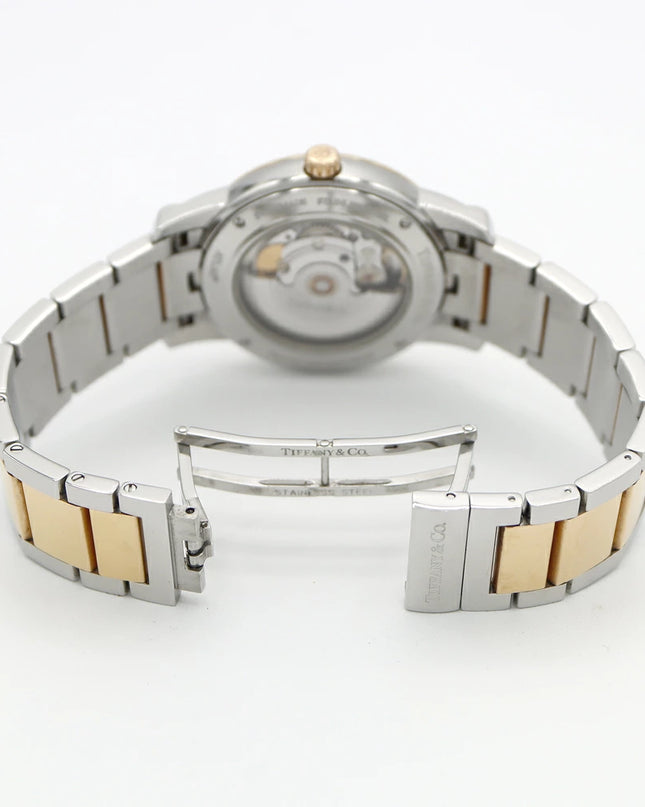 Preloved Authentic Rank A Tiffany Atlas Dome TIFFANY & Co. Tiffany Atlas Dome Z1810.68.15A21A00A, 50m Water Resistant, Date Display, See-Through Back, Silver, Stainless Steel, and Yellow Gold, Men's Automatic Watch