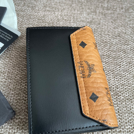 Preloved Authentic MCM Mena Trifold Wallet – Cognac Visetos