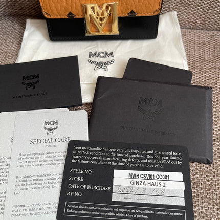 Preloved Authentic MCM Mena Trifold Wallet – Cognac Visetos