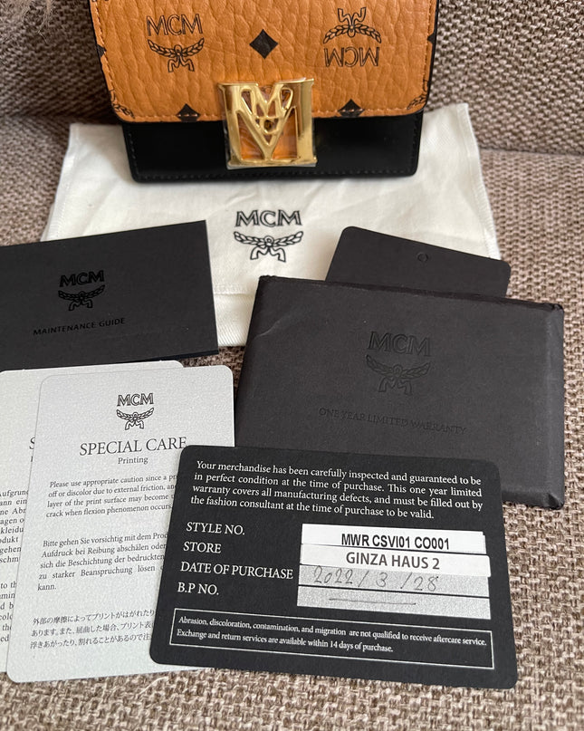 Preloved Authentic MCM Mena Trifold Wallet – Cognac Visetos