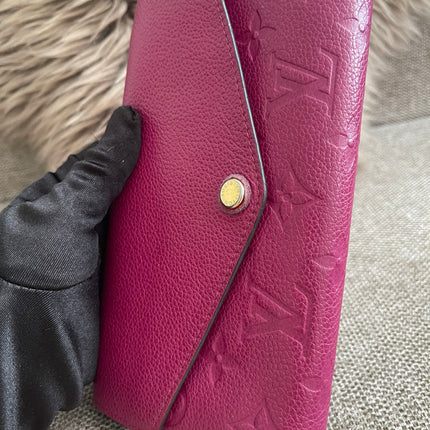 Preloved Authentic Louis Vuitton Monogram Empreinte Sarah Wallet – Fuchsia