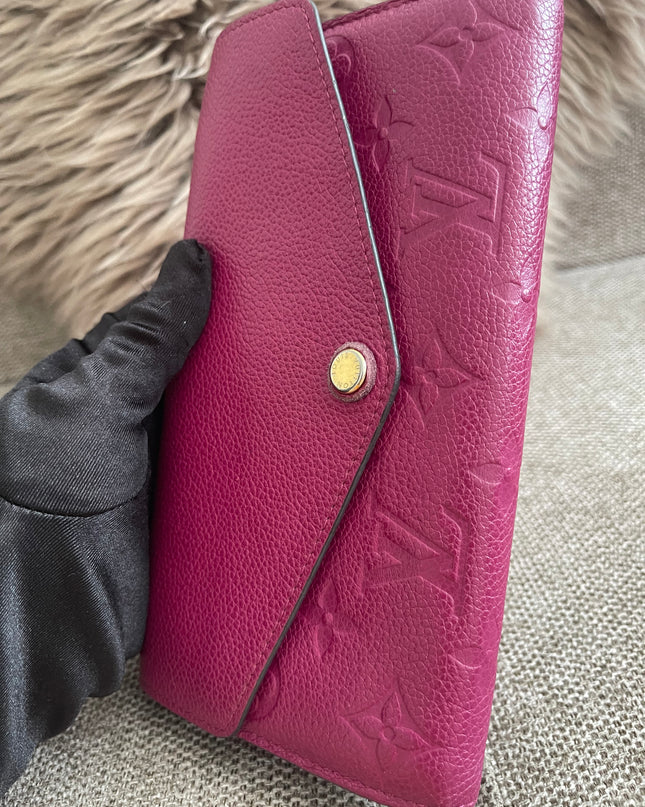 Preloved Authentic Louis Vuitton Monogram Empreinte Sarah Wallet – Fuchsia