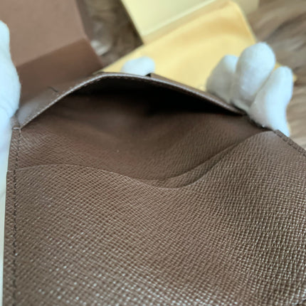 LOUIS VUITTON
Damier Ebene Canvas Pocket Organizer