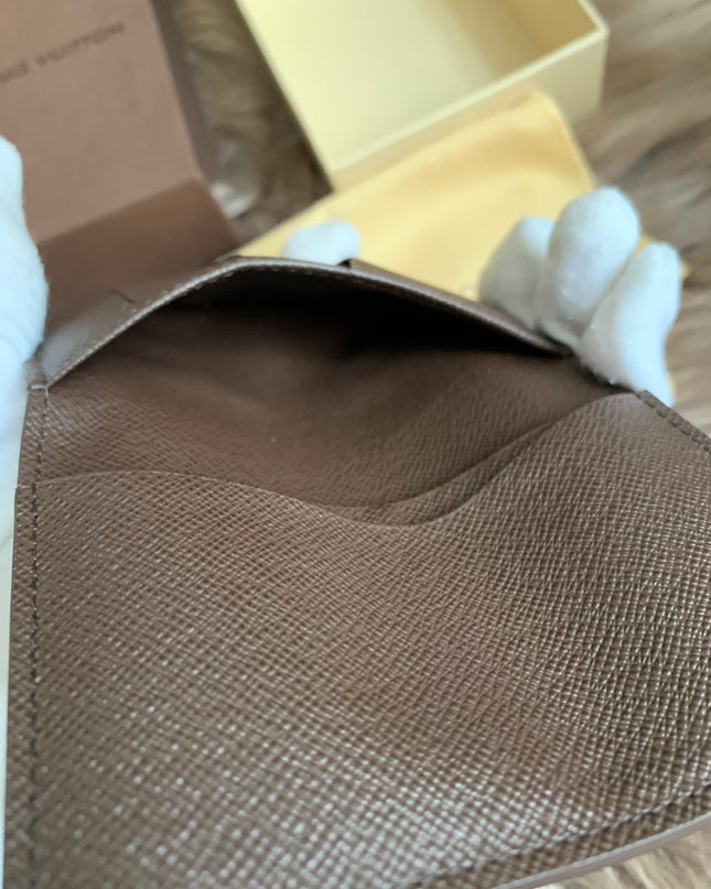 LOUIS VUITTON
Damier Ebene Canvas Pocket Organizer