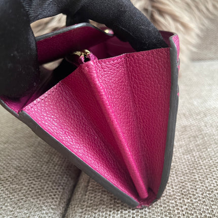 Preloved Authentic Louis Vuitton Monogram Empreinte Sarah Wallet – Fuchsia