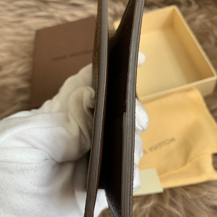 LOUIS VUITTON
Damier Ebene Canvas Pocket Organizer