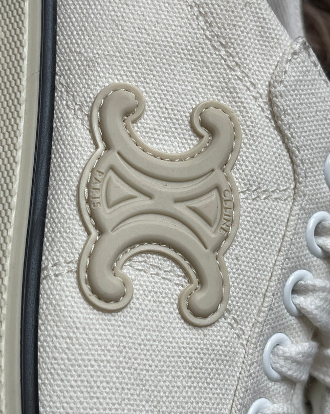 Preloved Authentic Celine Alan Sneaker with Triomphe in Canvas Off-White