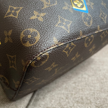 Preloved Authentic Louis Vuitton NéoNoé BB — Monogram Love Lock (Limited Edition)
