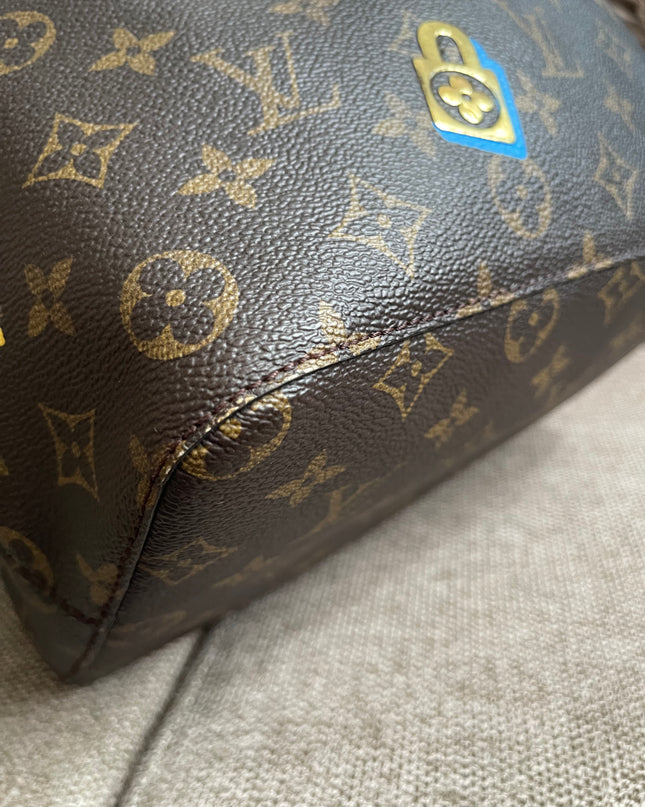 Preloved Authentic Louis Vuitton NéoNoé BB — Monogram Love Lock (Limited Edition)
