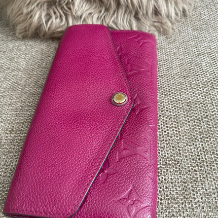 Preloved Authentic Louis Vuitton Monogram Empreinte Sarah Wallet – Fuchsia