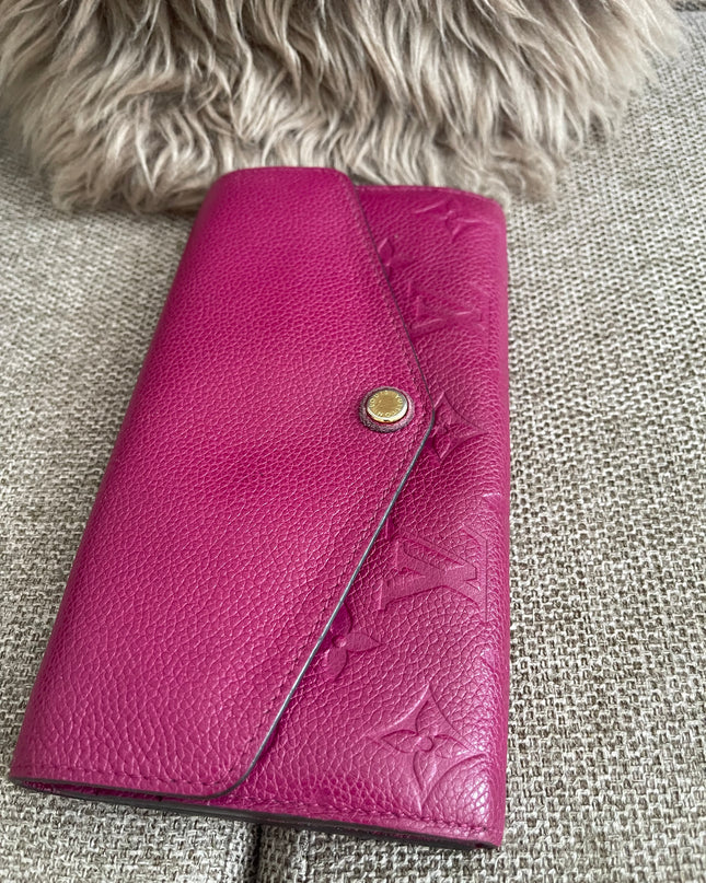 Preloved Authentic Louis Vuitton Monogram Empreinte Sarah Wallet – Fuchsia