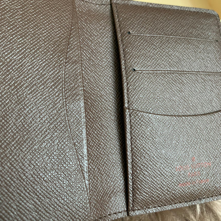 LOUIS VUITTON
Damier Ebene Canvas Pocket Organizer