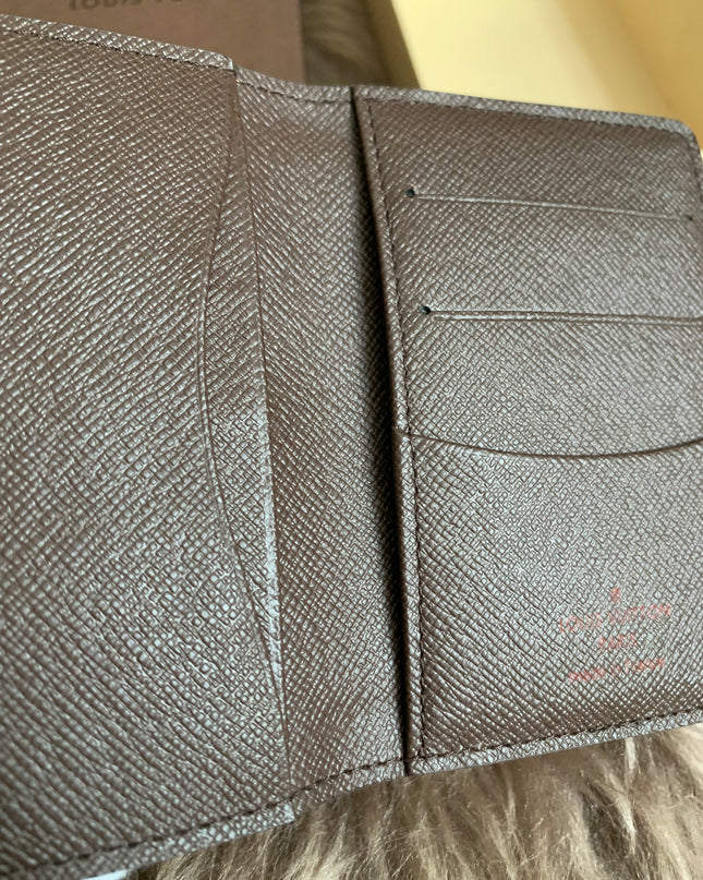 LOUIS VUITTON
Damier Ebene Canvas Pocket Organizer
