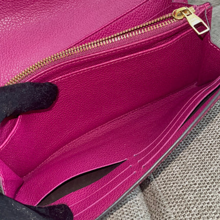 Preloved Authentic Louis Vuitton Monogram Empreinte Sarah Wallet – Fuchsia