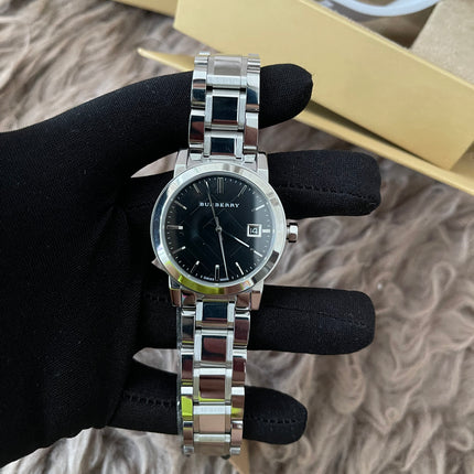Preloved Authentic Rank N Burberry The City BU9001 stainless steel watch with a black dial.
