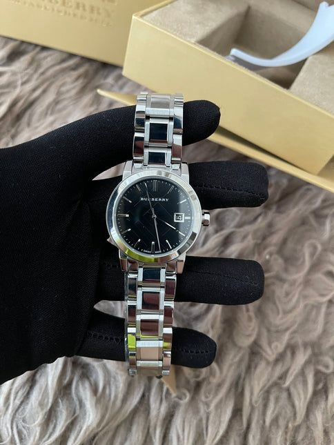 Preloved Authentic Rank N Burberry The City BU9001 stainless steel watch with a black dial.