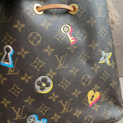 Preloved Authentic Louis Vuitton NéoNoé BB — Monogram Love Lock (Limited Edition)