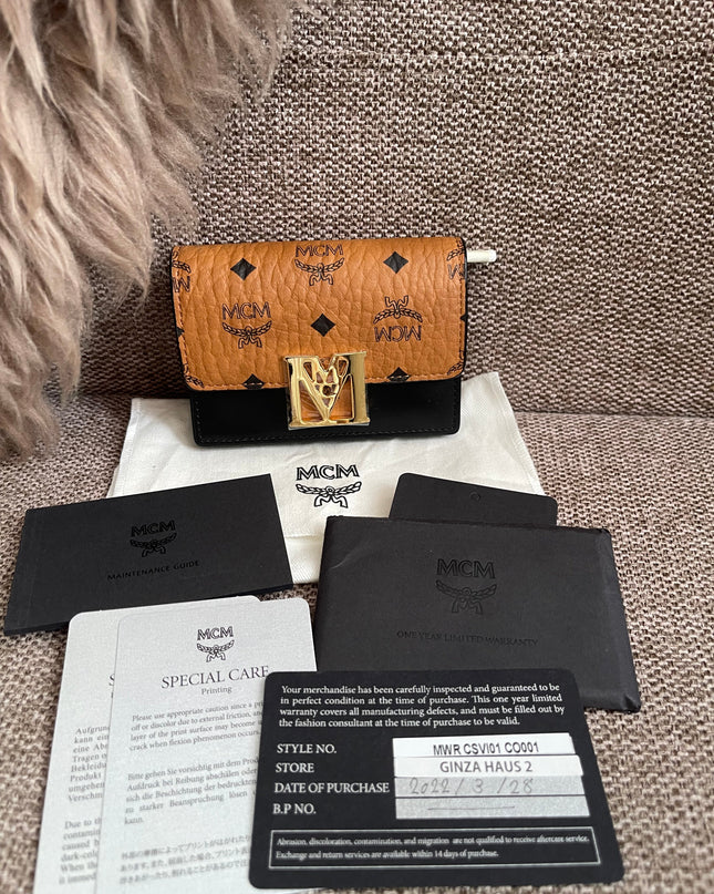 Preloved Authentic MCM Mena Trifold Wallet – Cognac Visetos