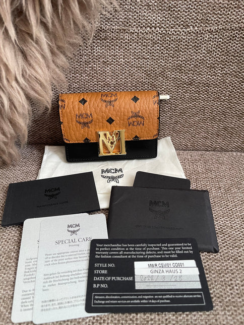 Preloved Authentic MCM Mena Trifold Wallet – Cognac Visetos