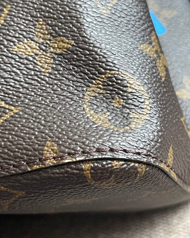 Preloved Authentic Louis Vuitton NéoNoé BB — Monogram Love Lock (Limited Edition)