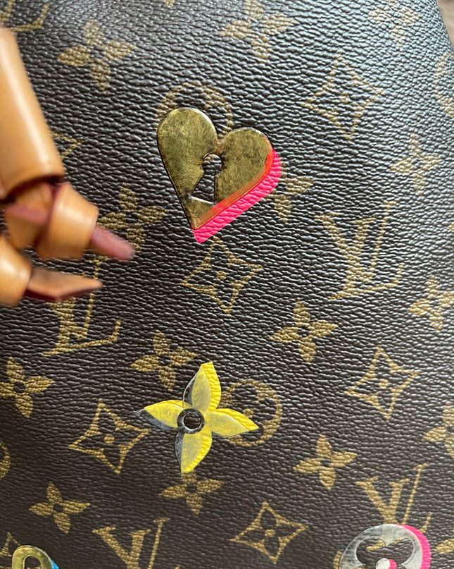 Preloved Authentic Louis Vuitton NéoNoé BB — Monogram Love Lock (Limited Edition)