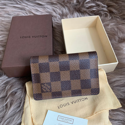 LOUIS VUITTON
Damier Ebene Canvas Pocket Organizer