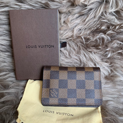 LOUIS VUITTON
Damier Ebene Canvas Pocket Organizer