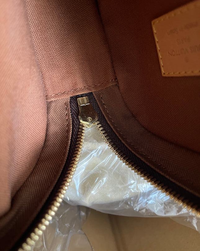 Preloved Louis Vuitton Pre-Owned
2004 Pochette Gange belt bag