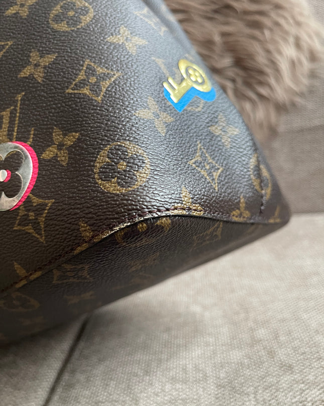 Preloved Authentic Louis Vuitton NéoNoé BB — Monogram Love Lock (Limited Edition)